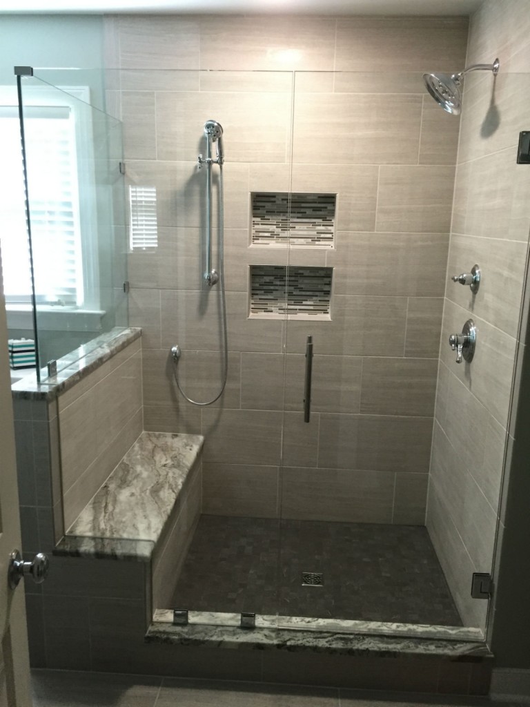 THIS CORNER FRAMELESS GLASS SHOWER ENCLOSURE FEATURES A DOUBLE NOTCHED PANEL TO FIT OVER THE BENCH SEAT &  KNEE WALL.  WOODLAKE SUBDIVISION RICHMOND VA